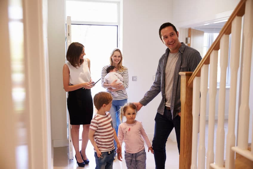 Happy family buying a home in Cleveland Ohio with Keller Williams